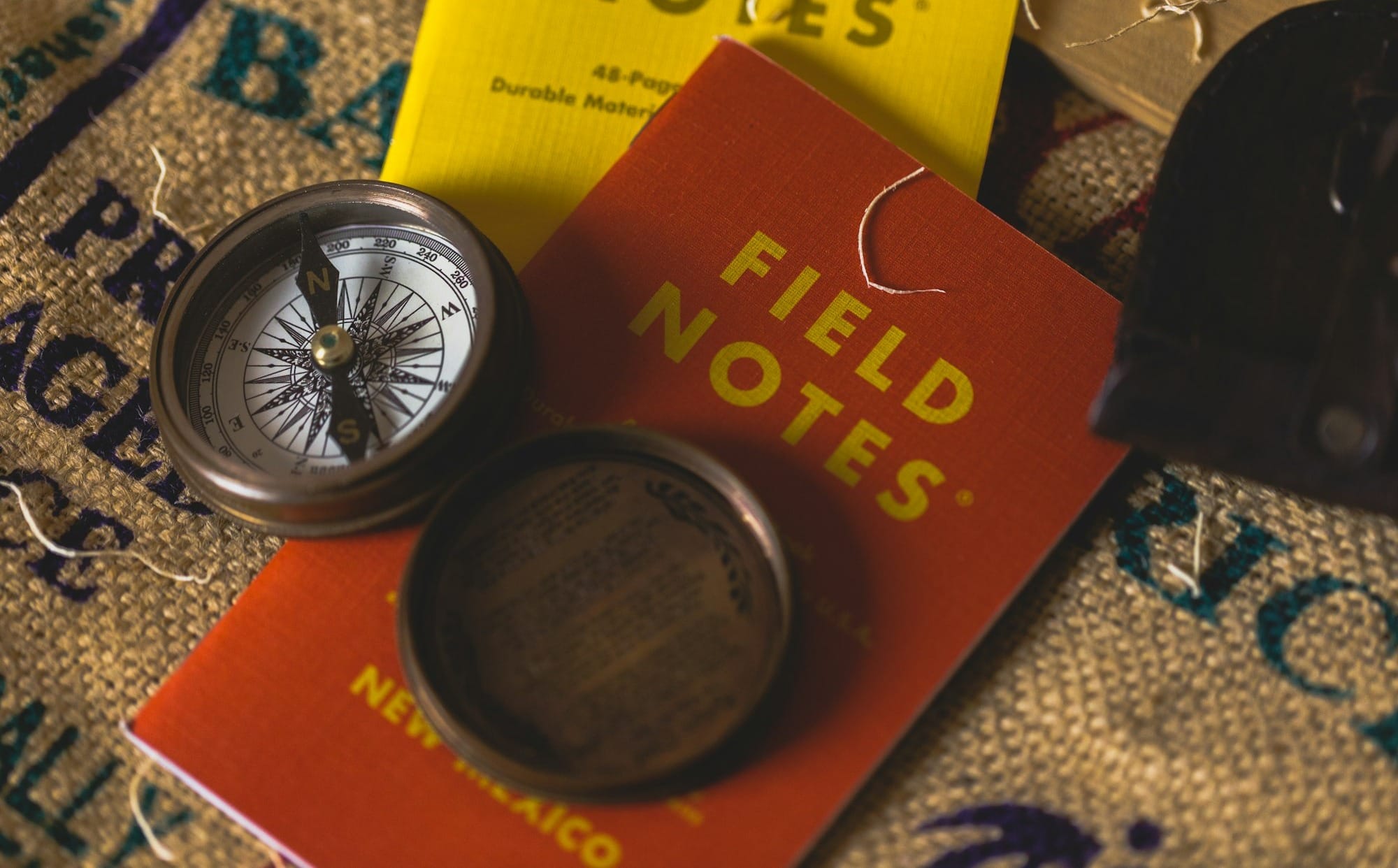 round white and black direction compass